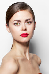 Girl with bare shoulders Red lips attractive look model bright makeup 