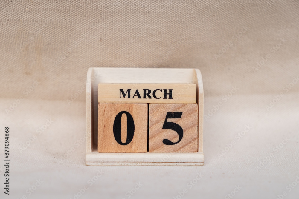 Fototapete march 5th. image of march 5 pastel color calendar on white canvas background. empty space for text