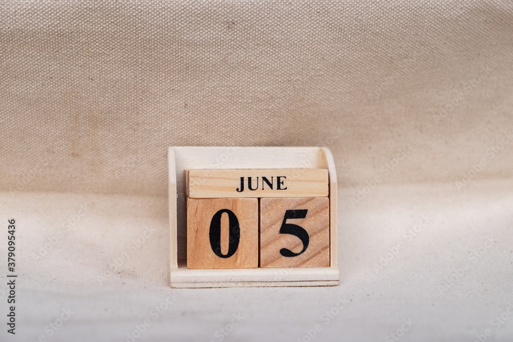 Fototapete june 5th. image of june 5 wooden color calendar on white canvas background. empty space for text