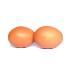 Two chicken eggs isolated on white background