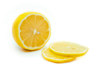 Sliced yellow lemon isolated on a white background. Fresh juicy lemon.