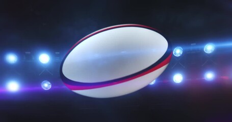 Flying rugby ball with flashing stadium spotlights in the night. Rotating sport ball. Sport 4k video background in endless loop.