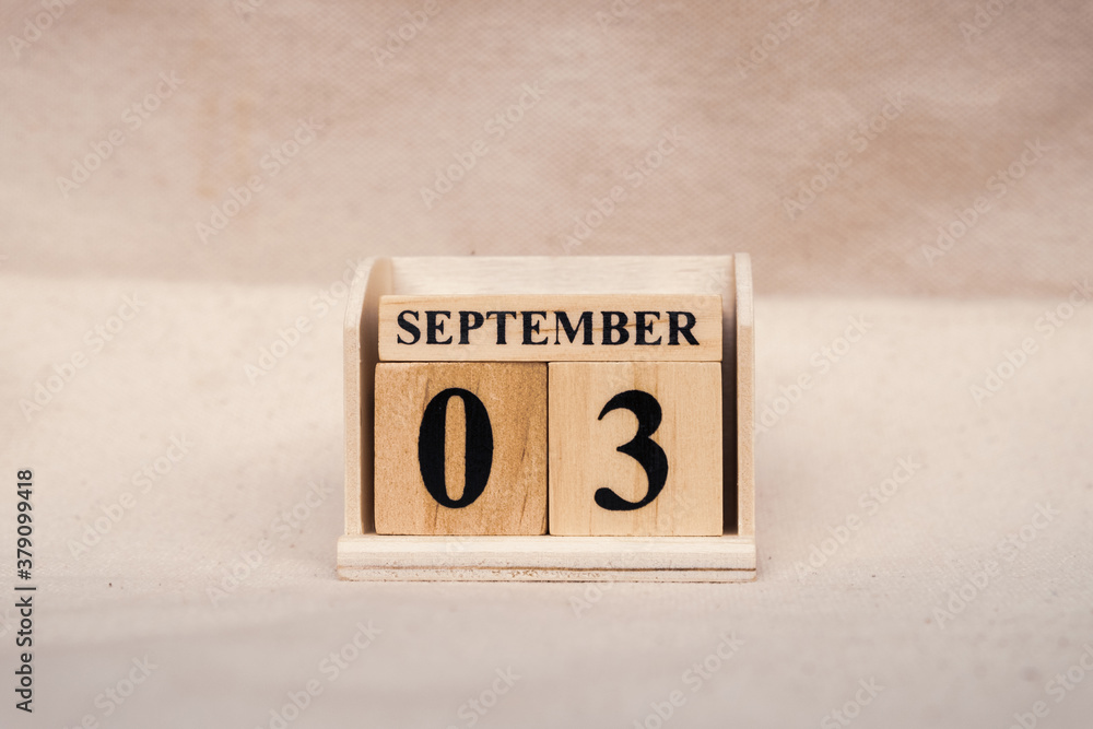 Fototapete september 3rd. image of september 3 wooden color calendar on white canvas background. empty space fo