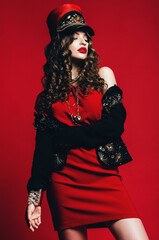 hot woman in red hat and black jacket