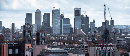 City of London  East side, Canary Wharf skyscrapers panoramic view. Office buildings, banks, international financial district. London, UK