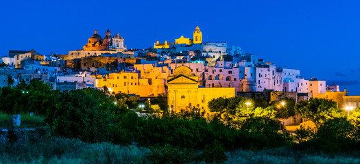 Obraz premium Panoramic night view of Ostuni, Apulia, Italy