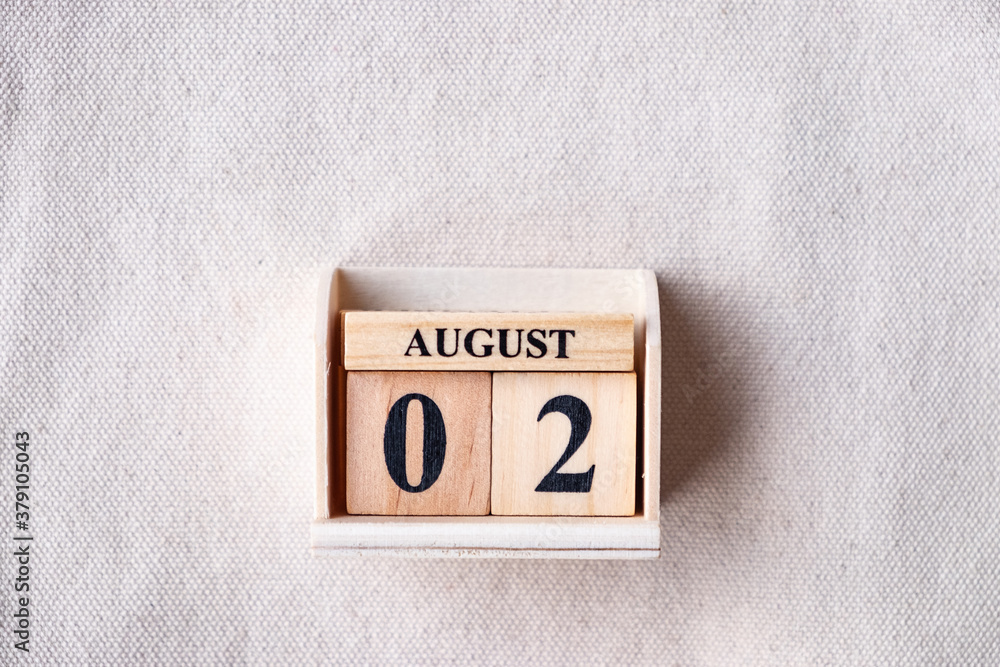 Fototapete august 2nd. image of august 2 wooden color calendar on white canvas background. empty space for text