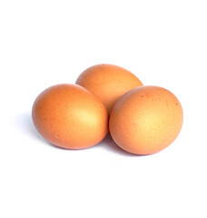 Three chicken eggs isolated on white background