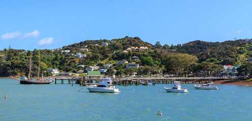 Fototapeta na wymiar Panoramic view of Russell, a tourist town in the Bay of Islands, New Zealand, from the water