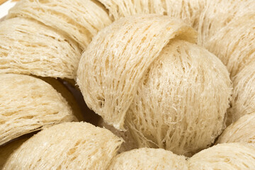 Fresh edible bird's nest on white paper