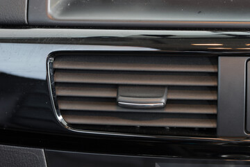Air conditioner vent grill in a modern car