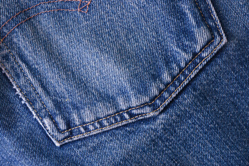 Closeup texture of back pocket blue denim jeanclose up texture of back pocket blue denim jeans.