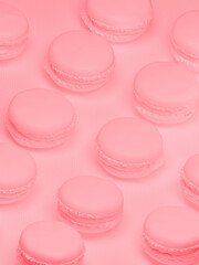 Pink macarons cakes on pink background. French sweets bakery macaroons. 3d illustration
