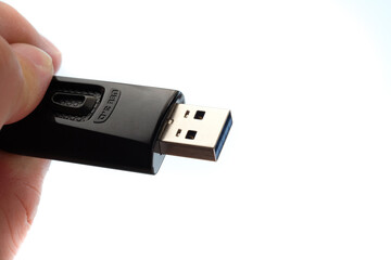 USB 3.0 tumb drive in a woman's hand