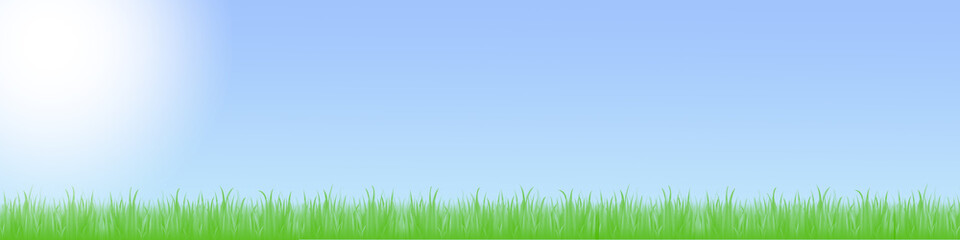 Fototapeta na wymiar Landschaft mit grüner Wiese und blauem Himmel mit Wolken