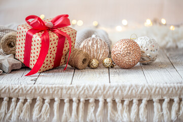 Beautiful Christmas background with Christmas toys and a gift box. © puhimec