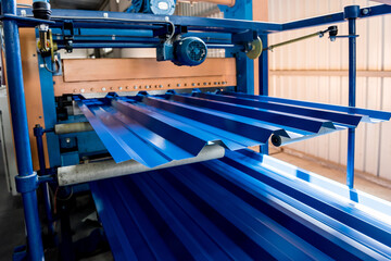 Metal sheet forming machine at the modern metalwork factory.
