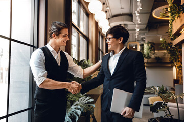 Happy Diversity Business People making Handshake Greeting. Partnership or Teamwork Concept