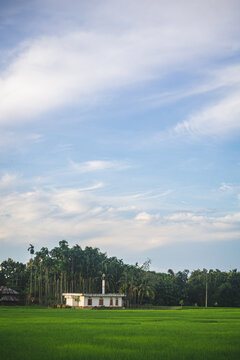 A mosque in open green field in Bangladesh