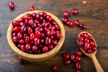 Dogwood berries in a wooden bowl