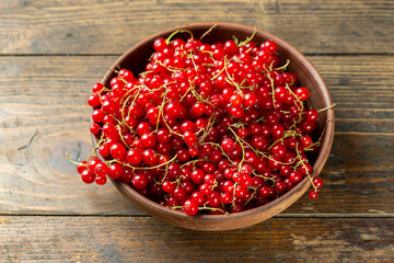 Fresh red currant berries in plate