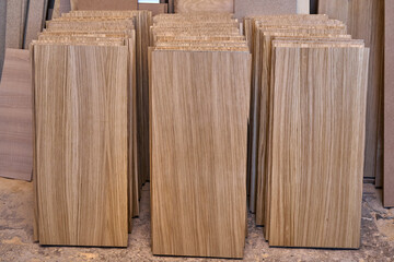 Veneer chipboard shelves. Production of wood furniture. Furniture manufacture. Close-up