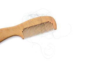 Hair loss, hair fall everyday serious problem, girl with a comb and problem hair on white background.	
