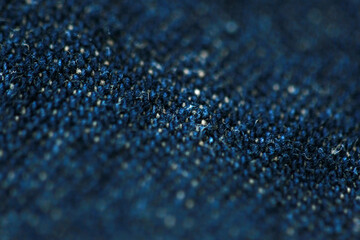 Jeans denim texture close up , focus only one point , soft blured background wallpaper