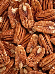 Pecans nuts top view. Source of healthy fats, fiber and protein.