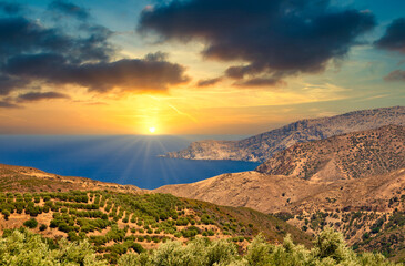 Coast on the island of Crete (Greece) at sunset.