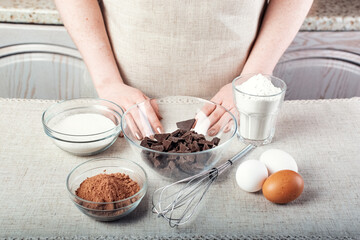 the ingredients for making chocolate cake flour sugar eggs and cocoa are placed in front of the chef