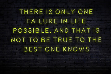 Smart and motivational quotation. Neon sign on brick wall