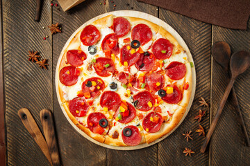 Pepperoni pizza with bell pepper and salami 