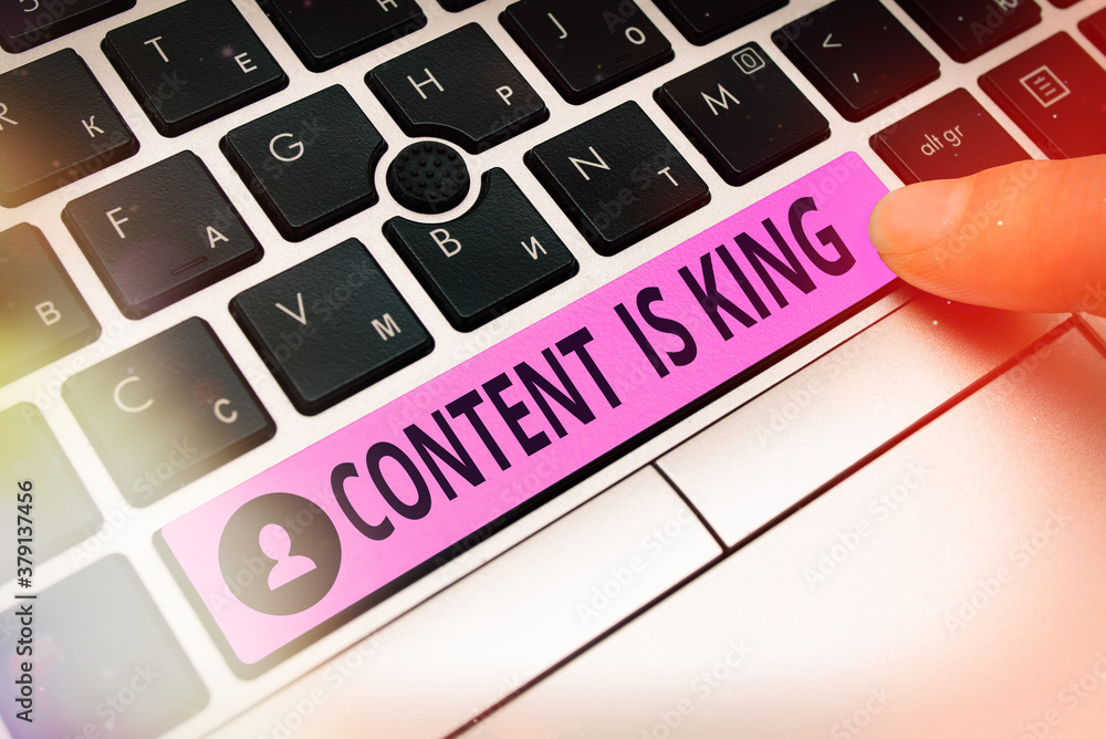 Poster conceptual hand writing showing content is king. concept meaning believe that content is central to 