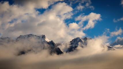 clouds over the mountains.Tirol