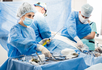 Surgery to remove the breast and replace it with an implant.
