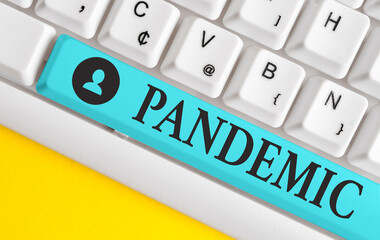 Text sign showing Pandemic. Business photo showcasing occurring over a wide area affecting high...