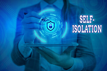 Conceptual hand writing showing Self Isolation. Concept meaning promoting infection control by...