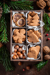Homemade gingerbread cookies for Christmas in a small wooden box