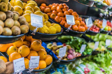 Fresh vegetables and fruits put up for sale in supermarket