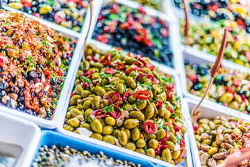 Assorted olives put up for sale on the italian street stall