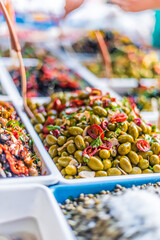 Assorted olives put up for sale on the italian street stall