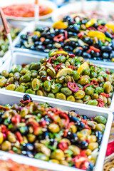 Assorted olives put up for sale on the italian street stall