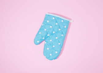 Oven glove on isolated pink background