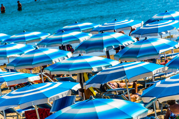 Umbrellas on the sandy sea beach