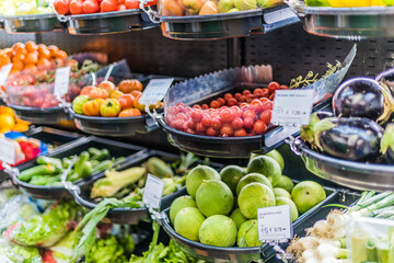 Fresh vegetables and fruits put up for sale in supermarket