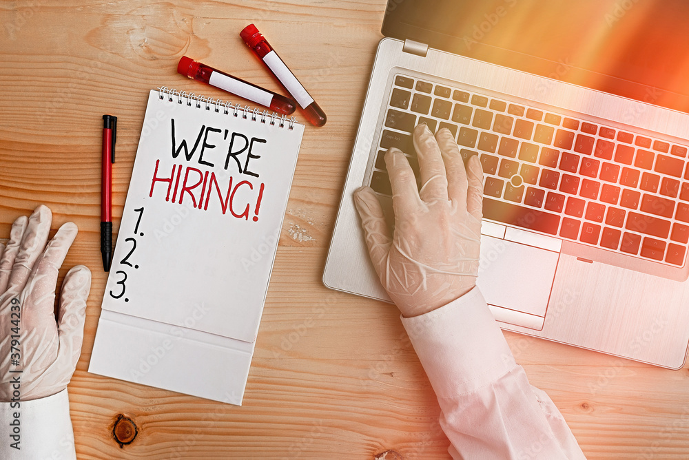 Poster text sign showing we re hiring. business photo text process of reviewing applications and finding ca