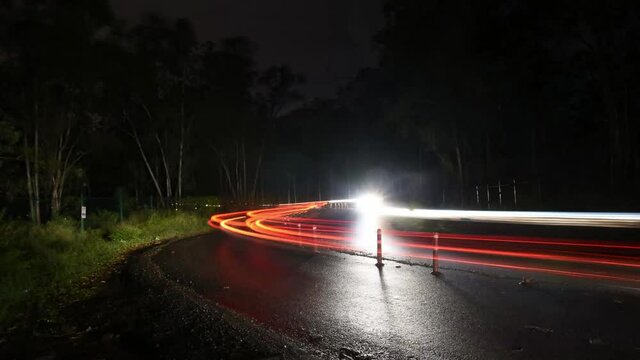 Hyper lapse footage of vehicles passing through one of the Bangalore's forest