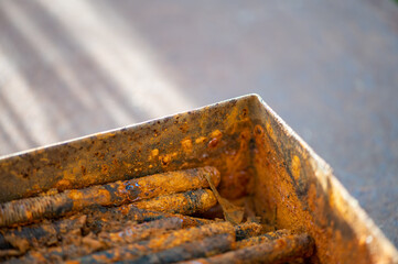 Old metal studs covered in rust, close-up, selective focus.