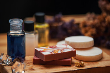 Obraz na płótnie Canvas Shampoo and soap products on wooden board
